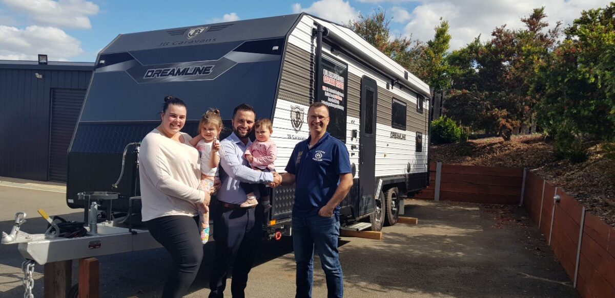 BPSC Secretary David Secen handed over the keys to the happy Henriques family. From left: Patricia, Penelope, Miguel, and little Ally.